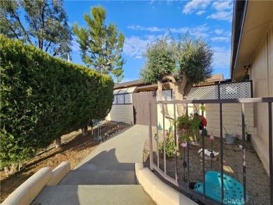 A well-kept spacious home nestled in a beautiful 55+ community on Sun Lakes Country Club in California - for sale on GolfHomes.com, golf home, golf lot
