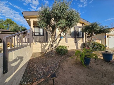 A well-kept spacious home nestled in a beautiful 55+ community on Sun Lakes Country Club in California - for sale on GolfHomes.com, golf home, golf lot