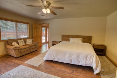 This perfect, cozy cabin is surrounded by Ponderosa Pines and on Pinetop Lakes Golf and Country Club in Arizona - for sale on GolfHomes.com, golf home, golf lot
