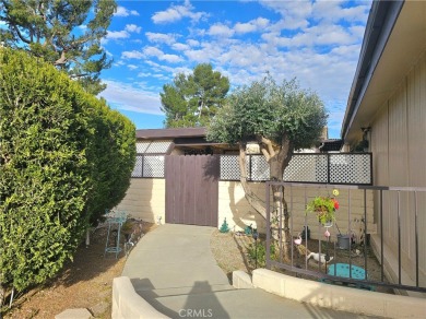 A well-kept spacious home nestled in a beautiful 55+ community on Sun Lakes Country Club in California - for sale on GolfHomes.com, golf home, golf lot