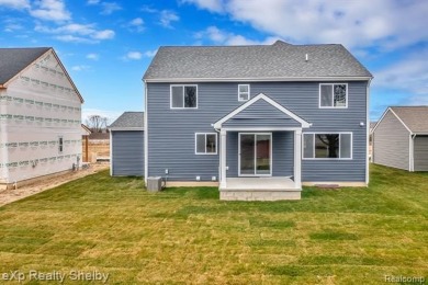 Welcome to your dream home in Macomb Township, set for Spring on Cracklewood Golf Club in Michigan - for sale on GolfHomes.com, golf home, golf lot