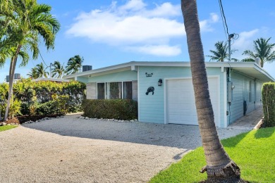 Experience island living at its finest in this beautifully on Key Colony Beach Golf Course in Florida - for sale on GolfHomes.com, golf home, golf lot