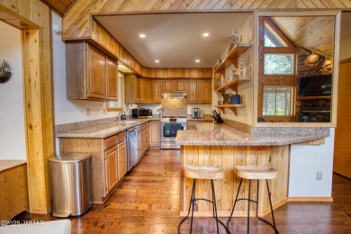 This cozy furnished A-frame cabin in Pinetop Lakes with Rec on Pinetop Lakes Golf and Country Club in Arizona - for sale on GolfHomes.com, golf home, golf lot