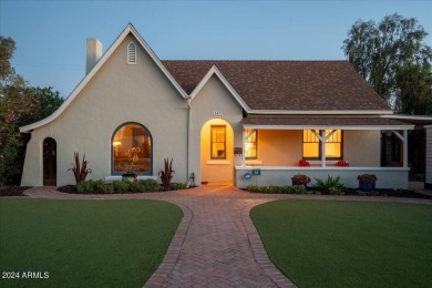 Stunning Tudor Revival home offering a perfect blend of classic on Encanto 18 Golf Course in Arizona - for sale on GolfHomes.com, golf home, golf lot