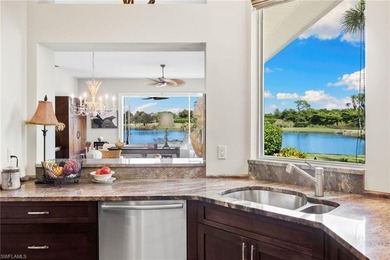 Enjoy spectacular panoramic lake and golf course views from this on Windstar on Naples Bay in Florida - for sale on GolfHomes.com, golf home, golf lot