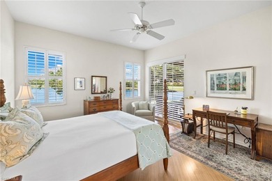 Enjoy spectacular panoramic lake and golf course views from this on Windstar on Naples Bay in Florida - for sale on GolfHomes.com, golf home, golf lot