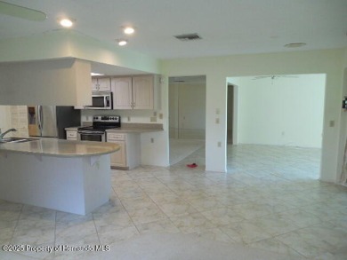 Looking for that big 2 bedroom home in a prestigious gated on Timber Pines Golf Course in Florida - for sale on GolfHomes.com, golf home, golf lot