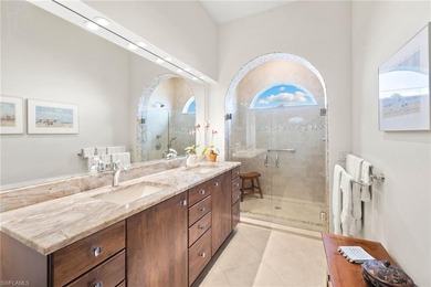 Enjoy spectacular panoramic lake and golf course views from this on Windstar on Naples Bay in Florida - for sale on GolfHomes.com, golf home, golf lot