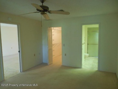 Looking for that big 2 bedroom home in a prestigious gated on Timber Pines Golf Course in Florida - for sale on GolfHomes.com, golf home, golf lot