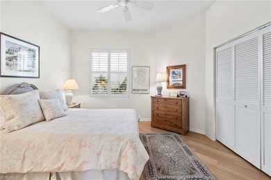 Enjoy spectacular panoramic lake and golf course views from this on Windstar on Naples Bay in Florida - for sale on GolfHomes.com, golf home, golf lot