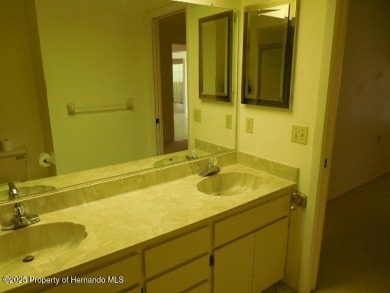 Looking for that big 2 bedroom home in a prestigious gated on Timber Pines Golf Course in Florida - for sale on GolfHomes.com, golf home, golf lot