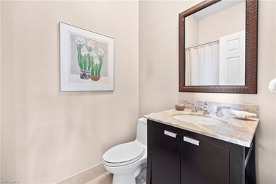 Enjoy spectacular panoramic lake and golf course views from this on Windstar on Naples Bay in Florida - for sale on GolfHomes.com, golf home, golf lot