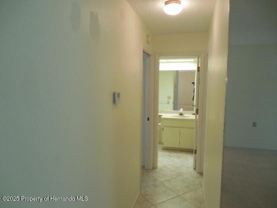 Looking for that big 2 bedroom home in a prestigious gated on Timber Pines Golf Course in Florida - for sale on GolfHomes.com, golf home, golf lot