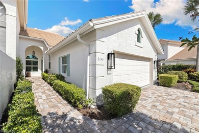 Enjoy spectacular panoramic lake and golf course views from this on Windstar on Naples Bay in Florida - for sale on GolfHomes.com, golf home, golf lot