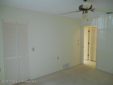 Looking for that big 2 bedroom home in a prestigious gated on Timber Pines Golf Course in Florida - for sale on GolfHomes.com, golf home, golf lot