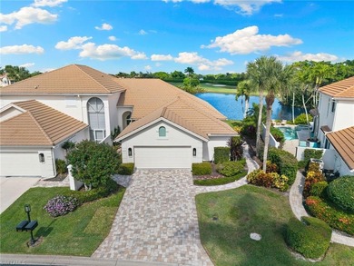 Enjoy spectacular panoramic lake and golf course views from this on Windstar on Naples Bay in Florida - for sale on GolfHomes.com, golf home, golf lot