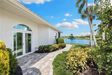 Enjoy spectacular panoramic lake and golf course views from this on Windstar on Naples Bay in Florida - for sale on GolfHomes.com, golf home, golf lot