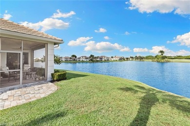 Enjoy spectacular panoramic lake and golf course views from this on Windstar on Naples Bay in Florida - for sale on GolfHomes.com, golf home, golf lot