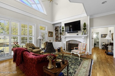 This beautiful brick home in River Landing seamlessly blends on River Landing Golf Course in North Carolina - for sale on GolfHomes.com, golf home, golf lot