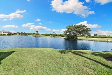 Enjoy spectacular panoramic lake and golf course views from this on Windstar on Naples Bay in Florida - for sale on GolfHomes.com, golf home, golf lot