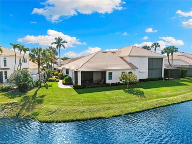 Enjoy spectacular panoramic lake and golf course views from this on Windstar on Naples Bay in Florida - for sale on GolfHomes.com, golf home, golf lot