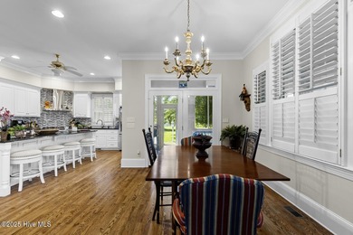 This beautiful brick home in River Landing seamlessly blends on River Landing Golf Course in North Carolina - for sale on GolfHomes.com, golf home, golf lot