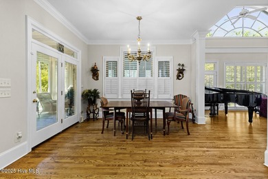 This beautiful brick home in River Landing seamlessly blends on River Landing Golf Course in North Carolina - for sale on GolfHomes.com, golf home, golf lot