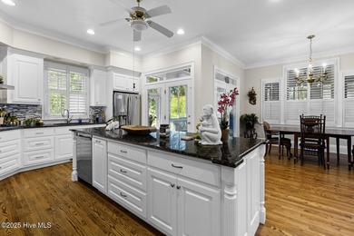 This beautiful brick home in River Landing seamlessly blends on River Landing Golf Course in North Carolina - for sale on GolfHomes.com, golf home, golf lot