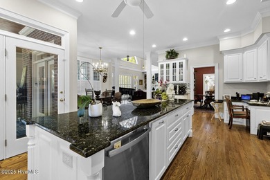 This beautiful brick home in River Landing seamlessly blends on River Landing Golf Course in North Carolina - for sale on GolfHomes.com, golf home, golf lot