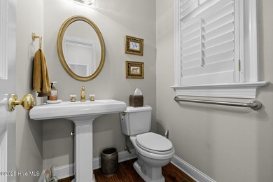 This beautiful brick home in River Landing seamlessly blends on River Landing Golf Course in North Carolina - for sale on GolfHomes.com, golf home, golf lot