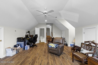 This beautiful brick home in River Landing seamlessly blends on River Landing Golf Course in North Carolina - for sale on GolfHomes.com, golf home, golf lot