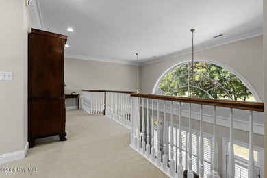 This beautiful brick home in River Landing seamlessly blends on River Landing Golf Course in North Carolina - for sale on GolfHomes.com, golf home, golf lot