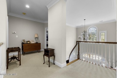 This beautiful brick home in River Landing seamlessly blends on River Landing Golf Course in North Carolina - for sale on GolfHomes.com, golf home, golf lot