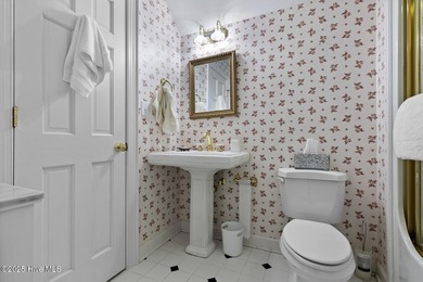 This beautiful brick home in River Landing seamlessly blends on River Landing Golf Course in North Carolina - for sale on GolfHomes.com, golf home, golf lot