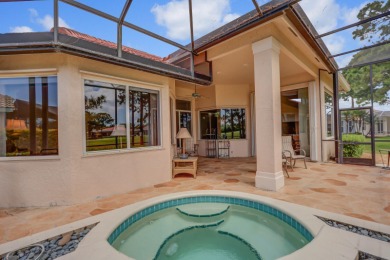 THIS PROPERTY IS A TRUE STANDOUT with an incredible backdrop of on PGA Golf Club in PGA Village in Florida - for sale on GolfHomes.com, golf home, golf lot