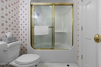 This beautiful brick home in River Landing seamlessly blends on River Landing Golf Course in North Carolina - for sale on GolfHomes.com, golf home, golf lot