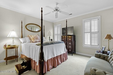 This beautiful brick home in River Landing seamlessly blends on River Landing Golf Course in North Carolina - for sale on GolfHomes.com, golf home, golf lot