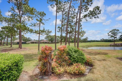 THIS PROPERTY IS A TRUE STANDOUT with an incredible backdrop of on PGA Golf Club in PGA Village in Florida - for sale on GolfHomes.com, golf home, golf lot