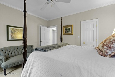 This beautiful brick home in River Landing seamlessly blends on River Landing Golf Course in North Carolina - for sale on GolfHomes.com, golf home, golf lot