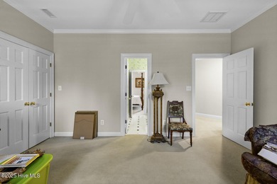 This beautiful brick home in River Landing seamlessly blends on River Landing Golf Course in North Carolina - for sale on GolfHomes.com, golf home, golf lot