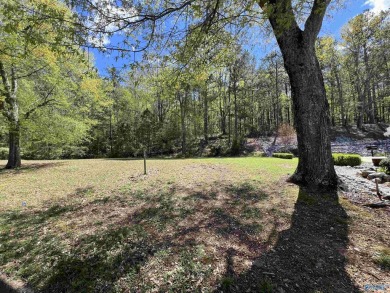 Nice cleared lot in Cane Creek subdivision. Privacy on side and on Cane Creek Golf Course in Alabama - for sale on GolfHomes.com, golf home, golf lot