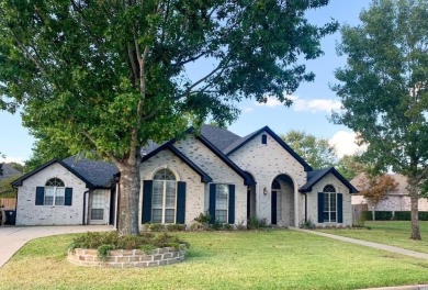 Located in Hollytree, this stunning home offers 4 spacious on Hollytree Country Club in Texas - for sale on GolfHomes.com, golf home, golf lot