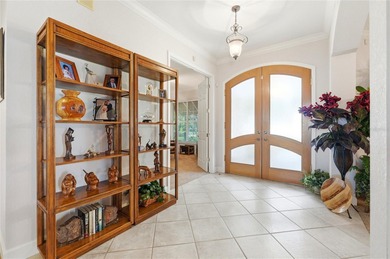 Originally constructed as a builder's model home, 108 Lake on Lake Region Yacht Country Club in Florida - for sale on GolfHomes.com, golf home, golf lot