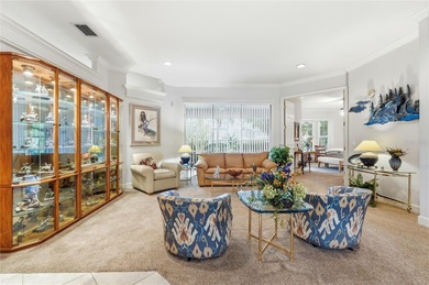 Originally constructed as a builder's model home, 108 Lake on Lake Region Yacht Country Club in Florida - for sale on GolfHomes.com, golf home, golf lot