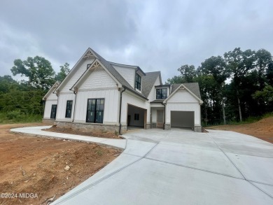 Exquisite new construction in River Forest Subdivision. Open on The Club River Forest in Georgia - for sale on GolfHomes.com, golf home, golf lot