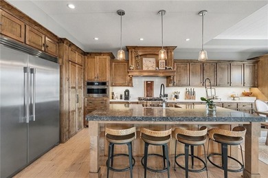 Built by Homes by Chris, this extraordinary 1.5-story home is a on Staley Farms Golf Club in Missouri - for sale on GolfHomes.com, golf home, golf lot