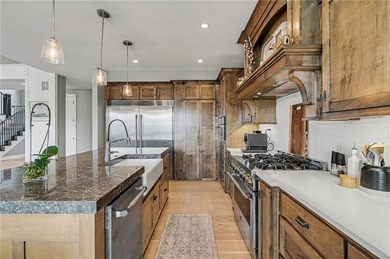 Built by Homes by Chris, this extraordinary 1.5-story home is a on Staley Farms Golf Club in Missouri - for sale on GolfHomes.com, golf home, golf lot