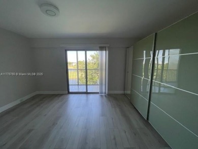 EXTRAORDINARLY BEAUTIFUL VIEW TO CANAL AND LAKE!  Completely on Flamingo Lakes Country Club in Florida - for sale on GolfHomes.com, golf home, golf lot