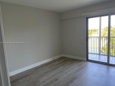 EXTRAORDINARLY BEAUTIFUL VIEW TO CANAL AND LAKE!  Completely on Flamingo Lakes Country Club in Florida - for sale on GolfHomes.com, golf home, golf lot