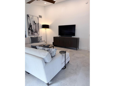 Stunning fully remodeled second-floor corner Bobby Jones on Gleneagles Golf and Country Club in Florida - for sale on GolfHomes.com, golf home, golf lot